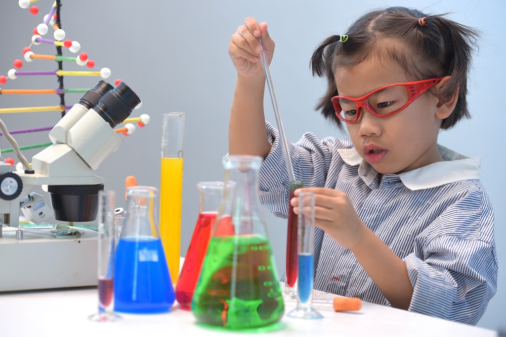 Child doing Science Experiment